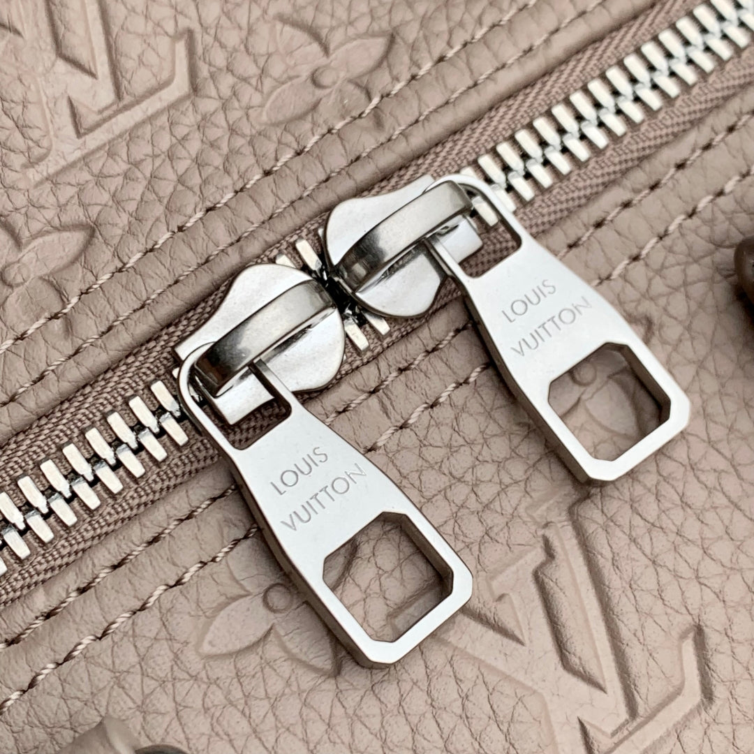 LOUIS VUITTON KEEPALL BANDOULIÈRE 34 BAG IN LIGHT BROWN MONOGRAM TAURILLON CALFSKIN