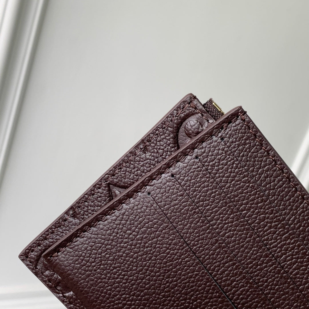 LOUIS VUITTON FÉLICIE POCHETTE 21 IN DARK BROWN MONOGRAM EMBOSSED LOGO CALFSKIN