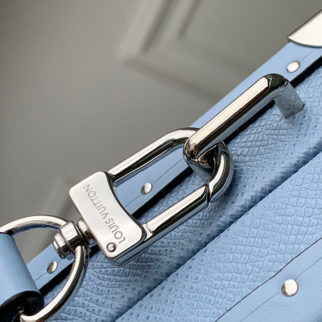 LOUIS VUITTON WALLET TRUNK TAIGARAMA 21.5 IN BLUE MONOGRAM COATED CANVAS
