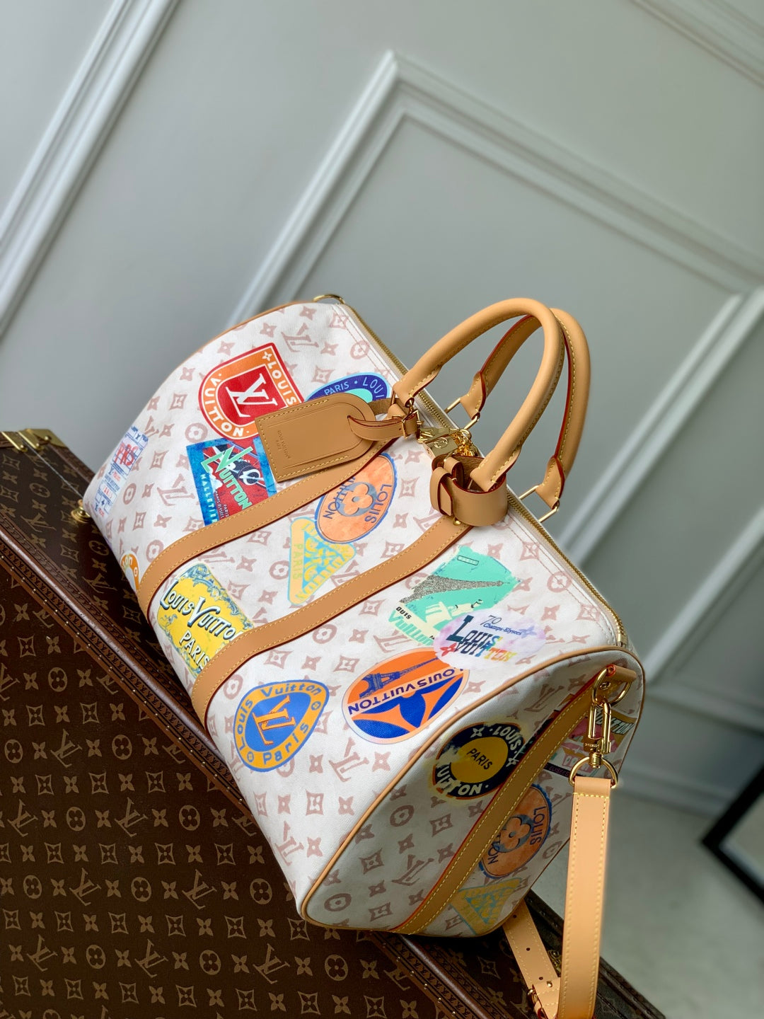 LOUIS VUITTON KEEPALL BANDOULIÈRE 45 IN WHITE MONOGRAM DUNE CANVAS AND CALFSKIN