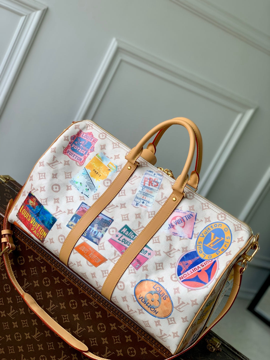 LOUIS VUITTON KEEPALL BANDOULIÈRE 45 IN WHITE MONOGRAM DUNE CANVAS AND CALFSKIN