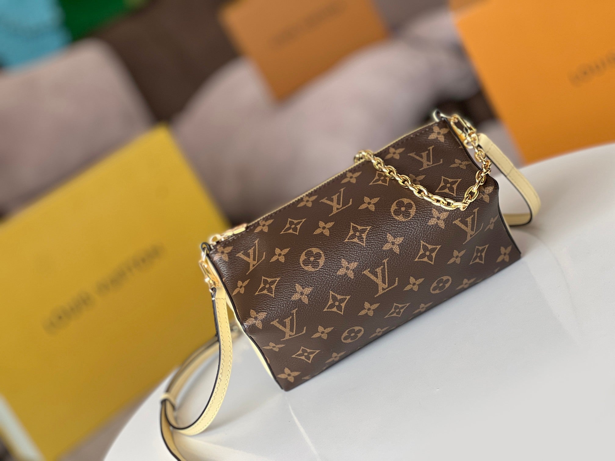LOUIS VUITTON BLOOM POUCH 22 IN BROWN MONOGRAM CANVAS AND PASTEL YELLOW CALFSKIN SIDES