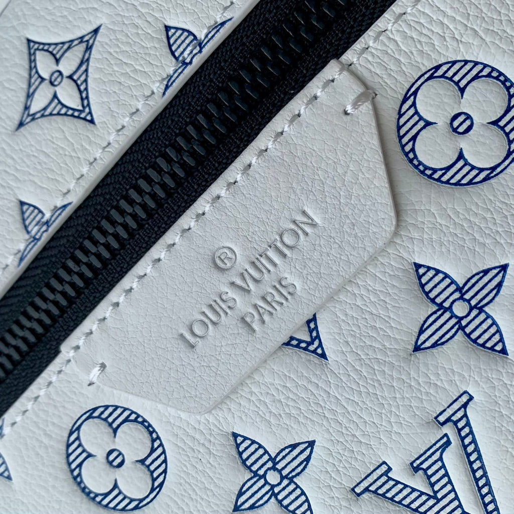 LOUIS VUITTON DISCOVERY PM BACKPACK 38 IN WHITE MONOGRAM LAMBSKIN
