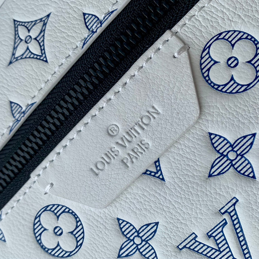 LOUIS VUITTON DISCOVERY PM BACKPACK 38 IN WHITE MONOGRAM LAMBSKIN