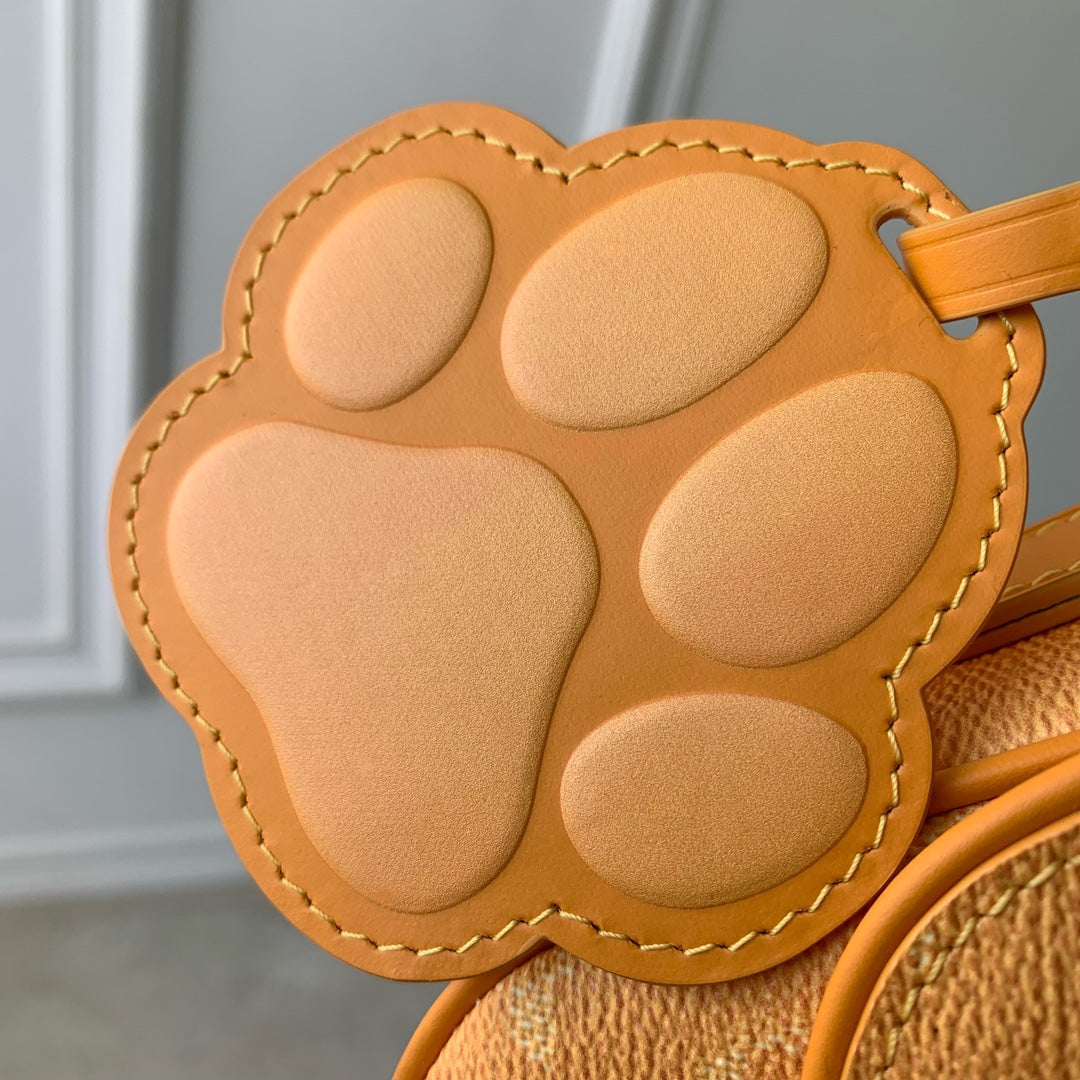 LOUIS VUITTON MONTSOURIS MESSENGER PM 20 IN PEPPER ORANGE MONOGRAM HERITAGE CANVAS