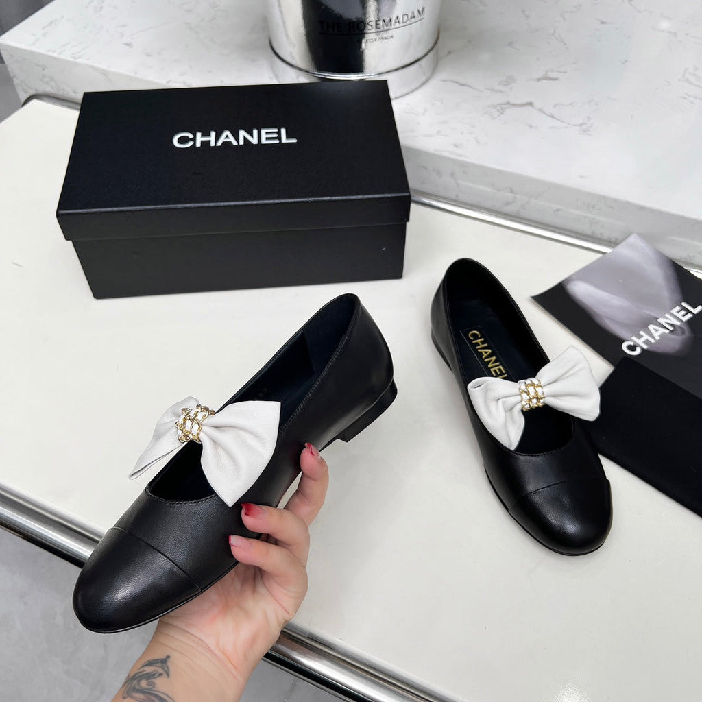 CHANEL 25S MARY JANES IN BLACK CALFSKIN WITH WHITE BOW GOLD HARDWARE