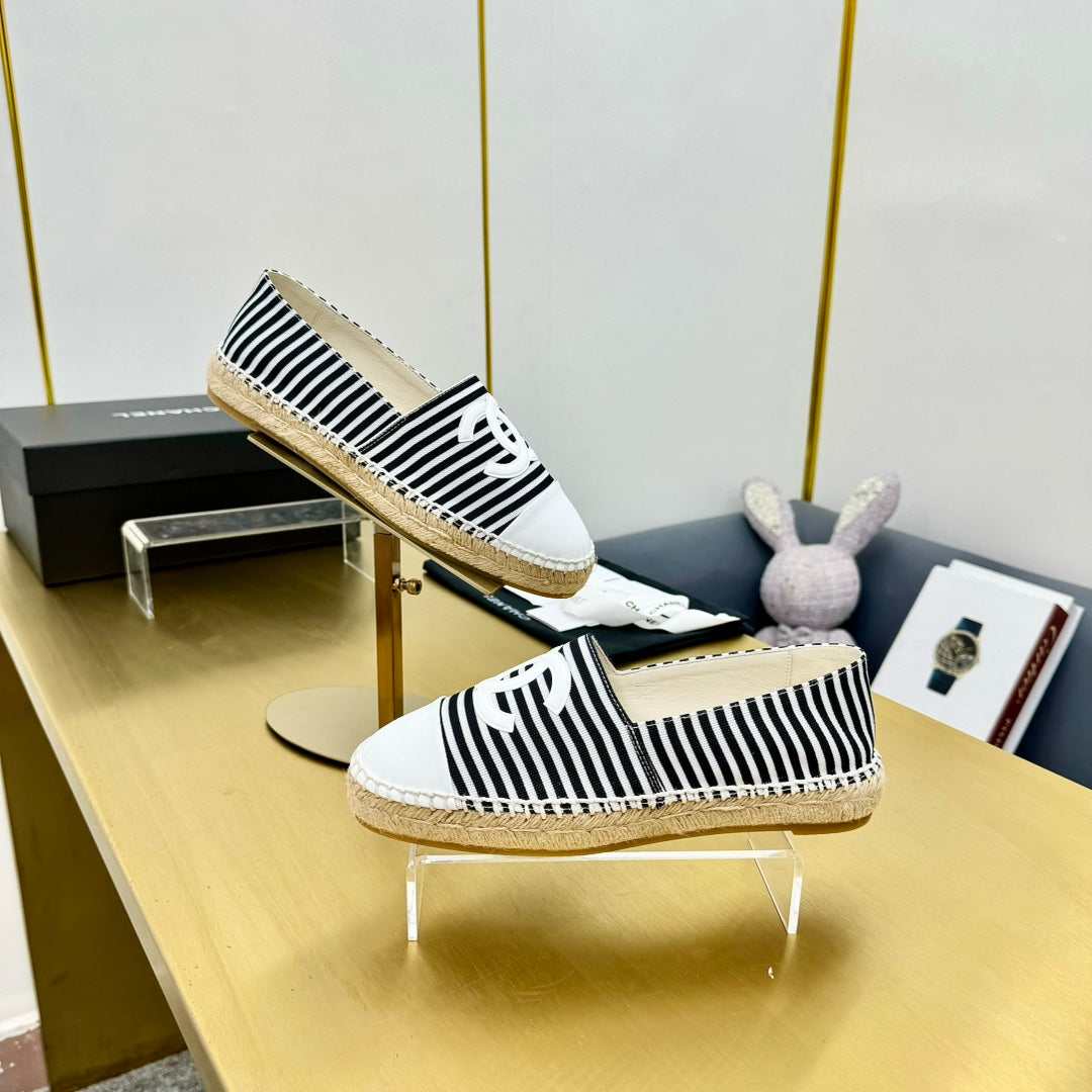 CHANEL SLIP-ON 25S IN BLACK AND WHITE FABRIC WITH STRIPED PATTERN
